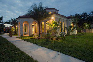 Jan. 17, 2016 MARLENE QUARONI | FC Exterior view of the new rectory-office building which echoes the architectural style of Assumption Church. Archbishop Thomas Wenski dedicated a new rectory and office building at Assumption Church in Lauderdale-By-The-Sea Jan. 16, 2016.